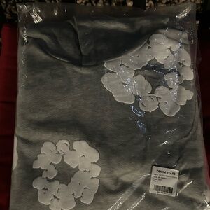 Denim Tears Gray Sweater with White Floral Design